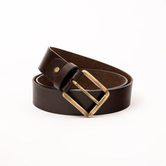 Photo of a casual dark brown leather belt with an antique copper buckle, shown rolled on a clean white background, highlighting the natural leather texture and classic high-quality finish.