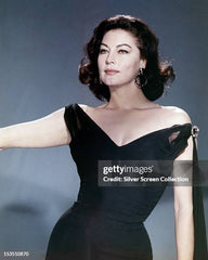 American actress Ava Gardner in a black, off-the-shoulder dress,... News Photo