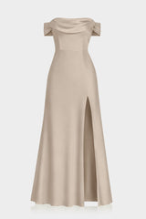Rustic outdoor wedding guest dress in neutral taupe satin tone.