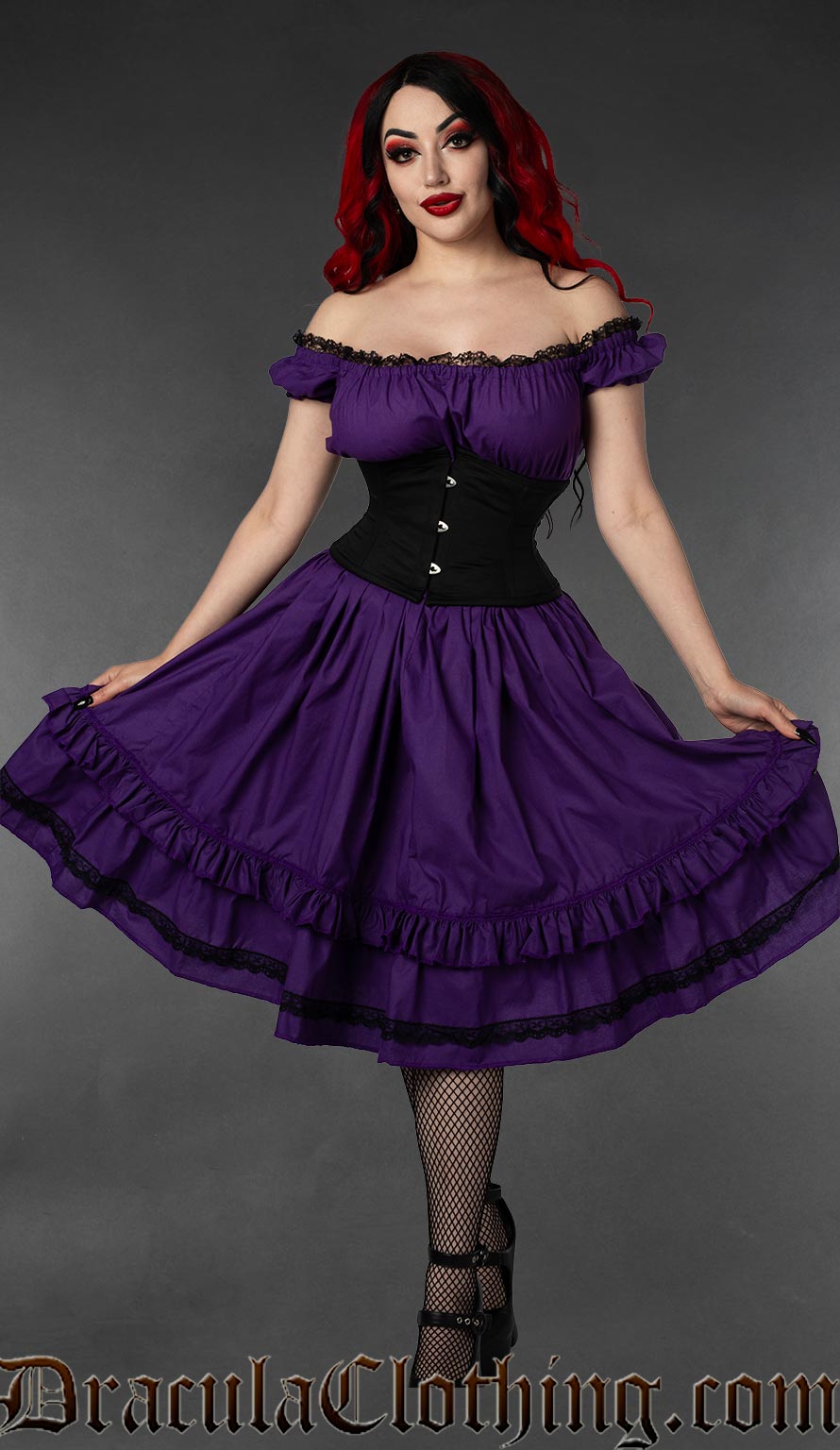 Purple women's knee length dress shown worn by model in an off shoulder style